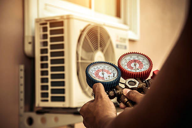 Professional Air Conditioning Service technician working in Columbia, TN